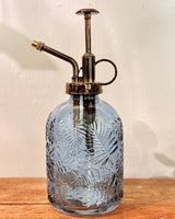 blue glass plant water mister