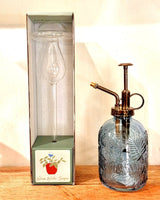 blue glass plant water mister